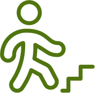 Grønt ikon av en person som går opp en trapp.